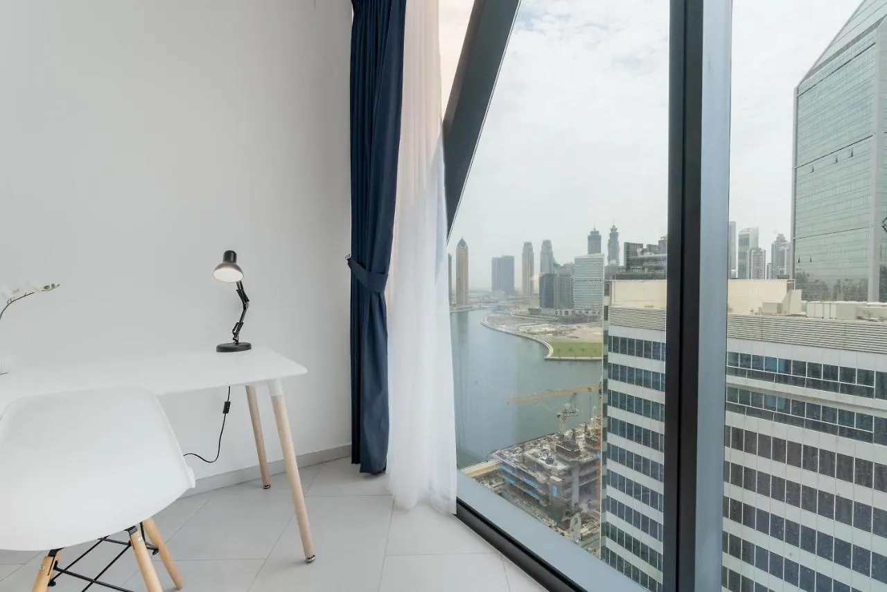 Apartment Ultimate Stay / 4 Beds / Burj Khalifa View / Ultra Modern / Business Bay Dubai