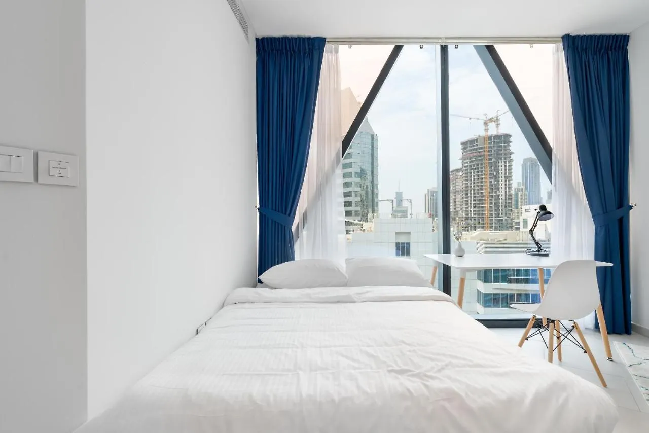 Apartment Ultimate Stay / 4 Beds / Burj Khalifa View / Ultra Modern / Business Bay Dubai